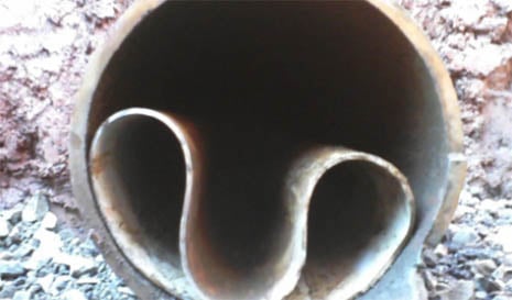 Cross section of Wastewater Pipe depicting CIPP failure