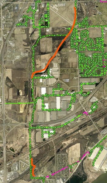 The overall routing of the RRI (green) and the two bypass setups (orange). In some locations the bypass deviated from the sewer and paralleled the creek